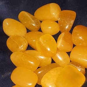 Juicey orange calcite tumbles